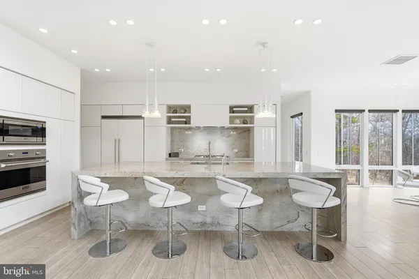 a room with gym equipment and windows