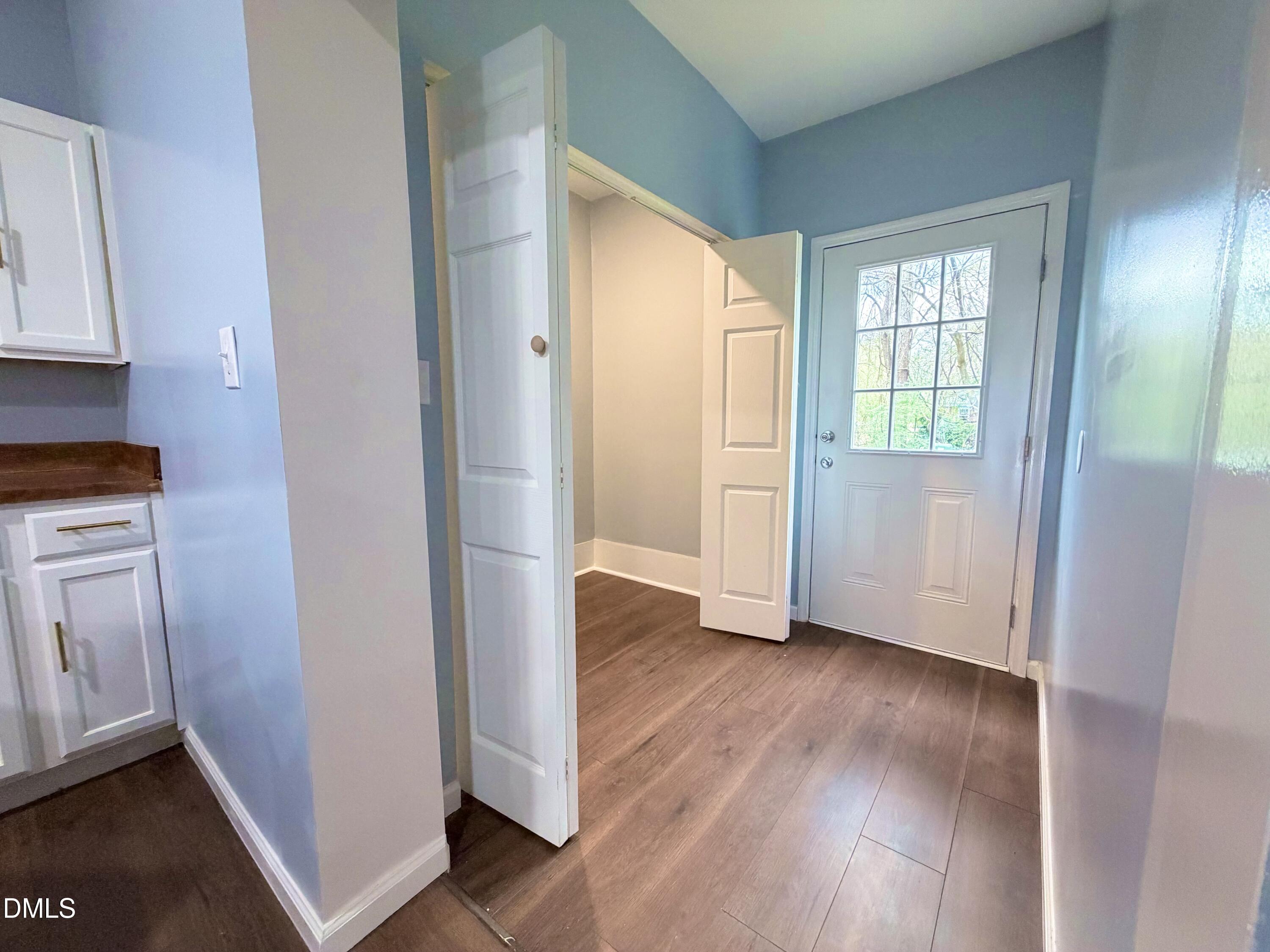 4408 Lee Street Ayden, NC 28513 - Photo 5 of 17 a view of an empty room with closet and a window