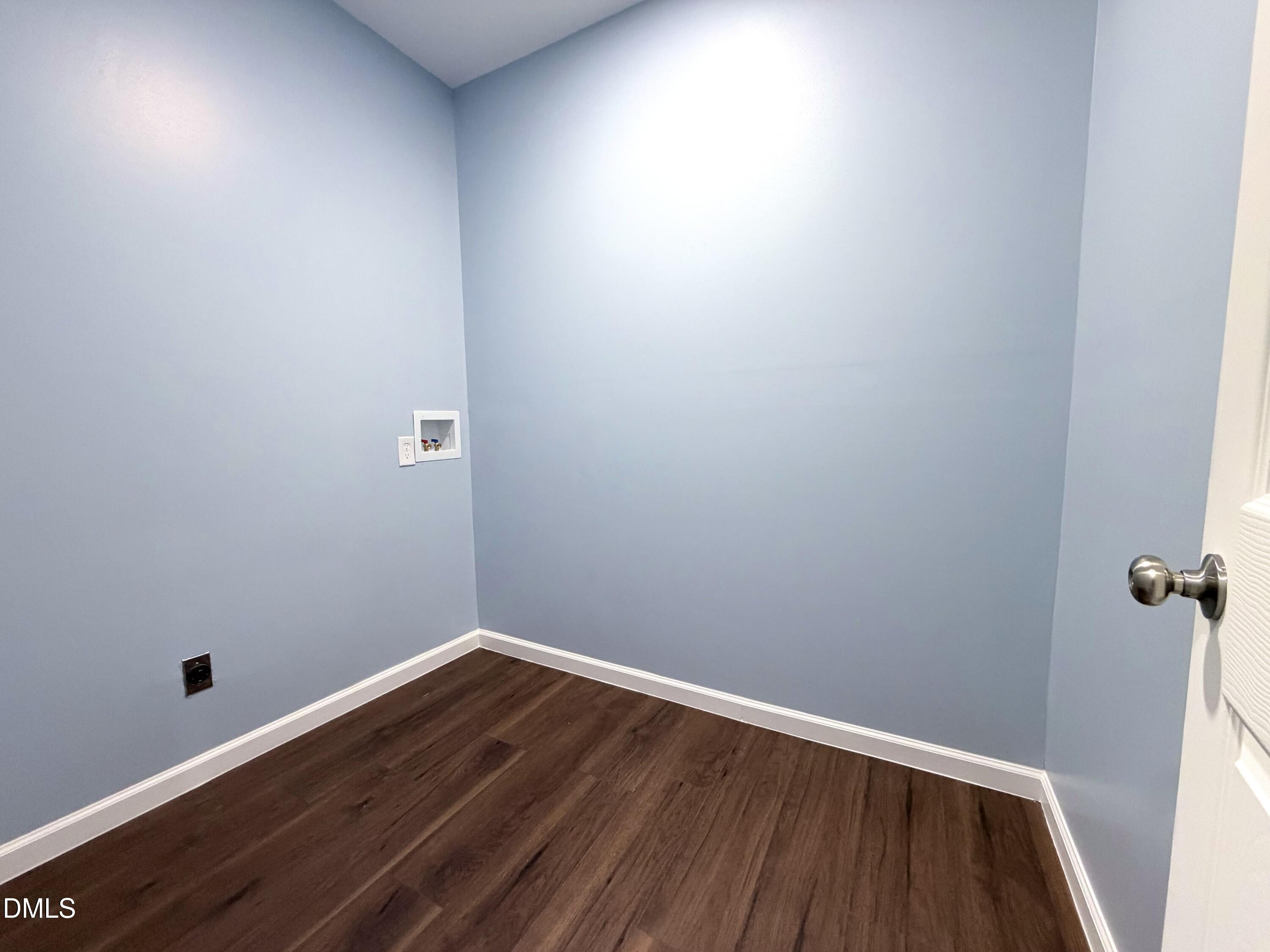 4408 Lee Street Ayden, NC 28513 - Photo 10 of 17 a view of an empty room and wooden floor