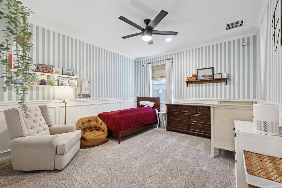 2913 Fallcrest Bend Leander, TX 78641 - Photo 22 of 40 a bedroom with furniture and a large window