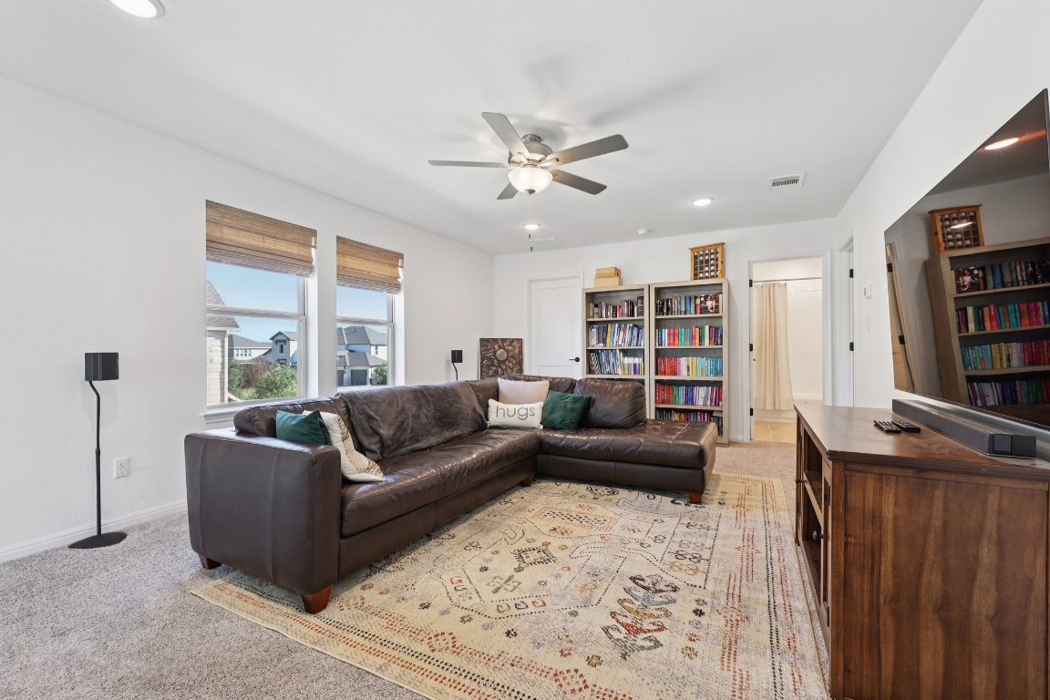 2913 Fallcrest Bend Leander, TX 78641 - Photo 26 of 40 a living room with furniture and a window