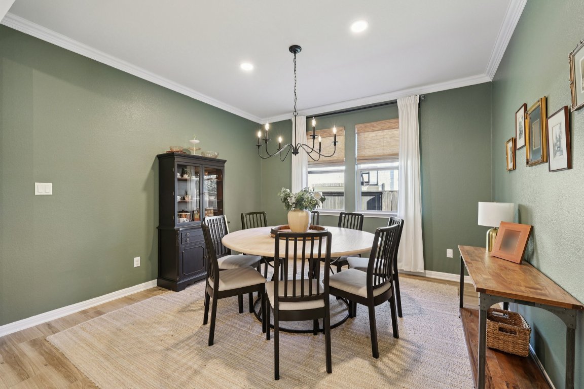 2913 Fallcrest Bend Leander, TX 78641 - Photo 8 of 40 a view of a dining room with furniture window and outside view