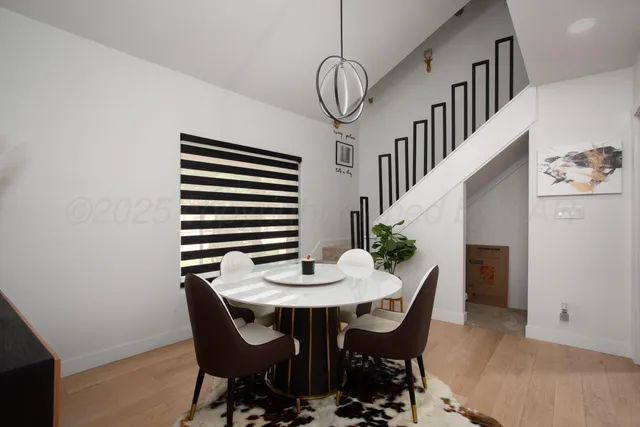 a view of a dining room with furniture