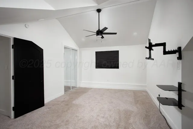 a view of a livingroom with a flat screen tv