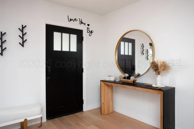 a view of living room with a front door