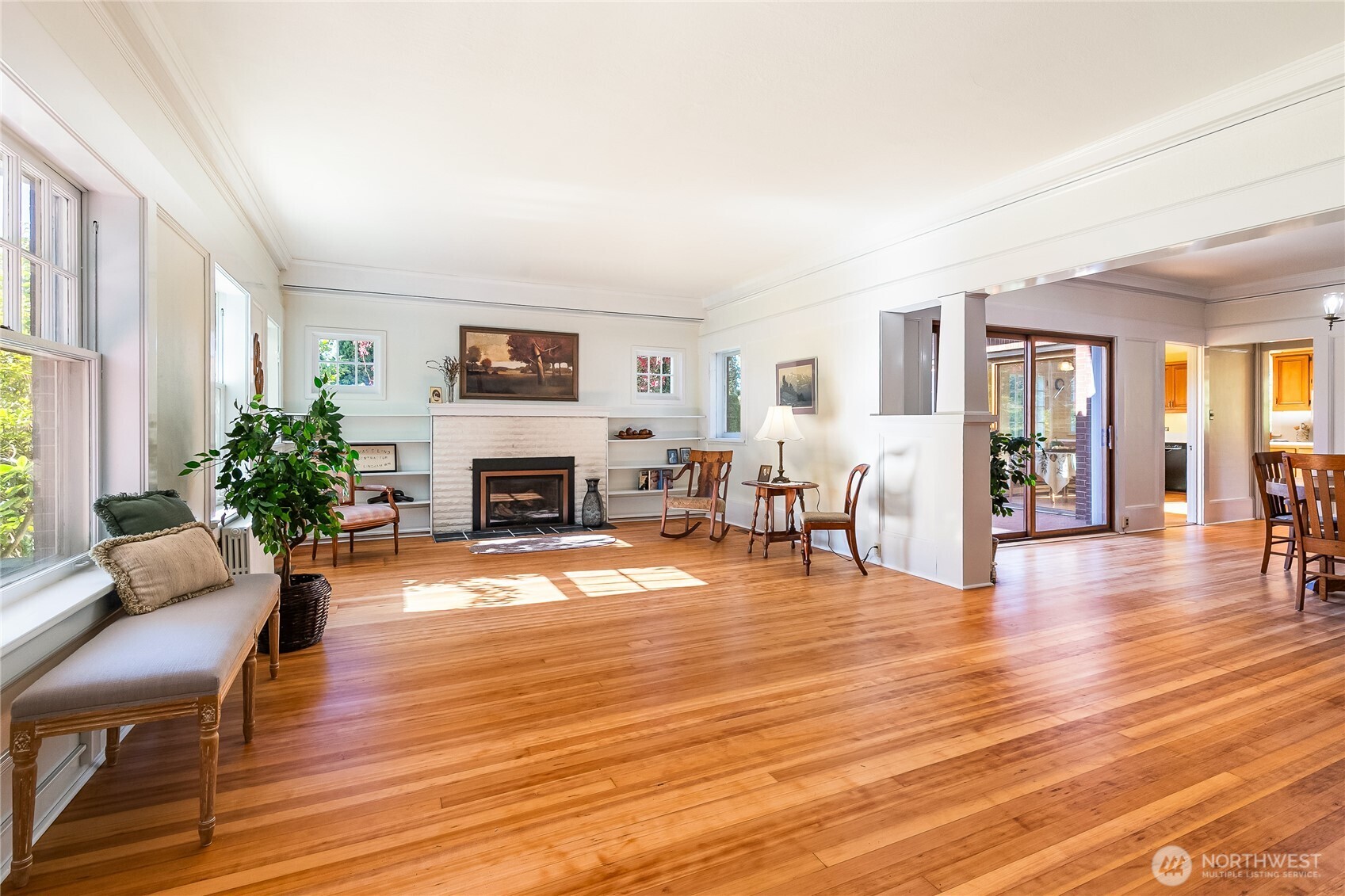 3905 Idaho Street Bellingham, WA 98229 - Photo 11 of 40 a living room with furniture a fireplace and wooden floor