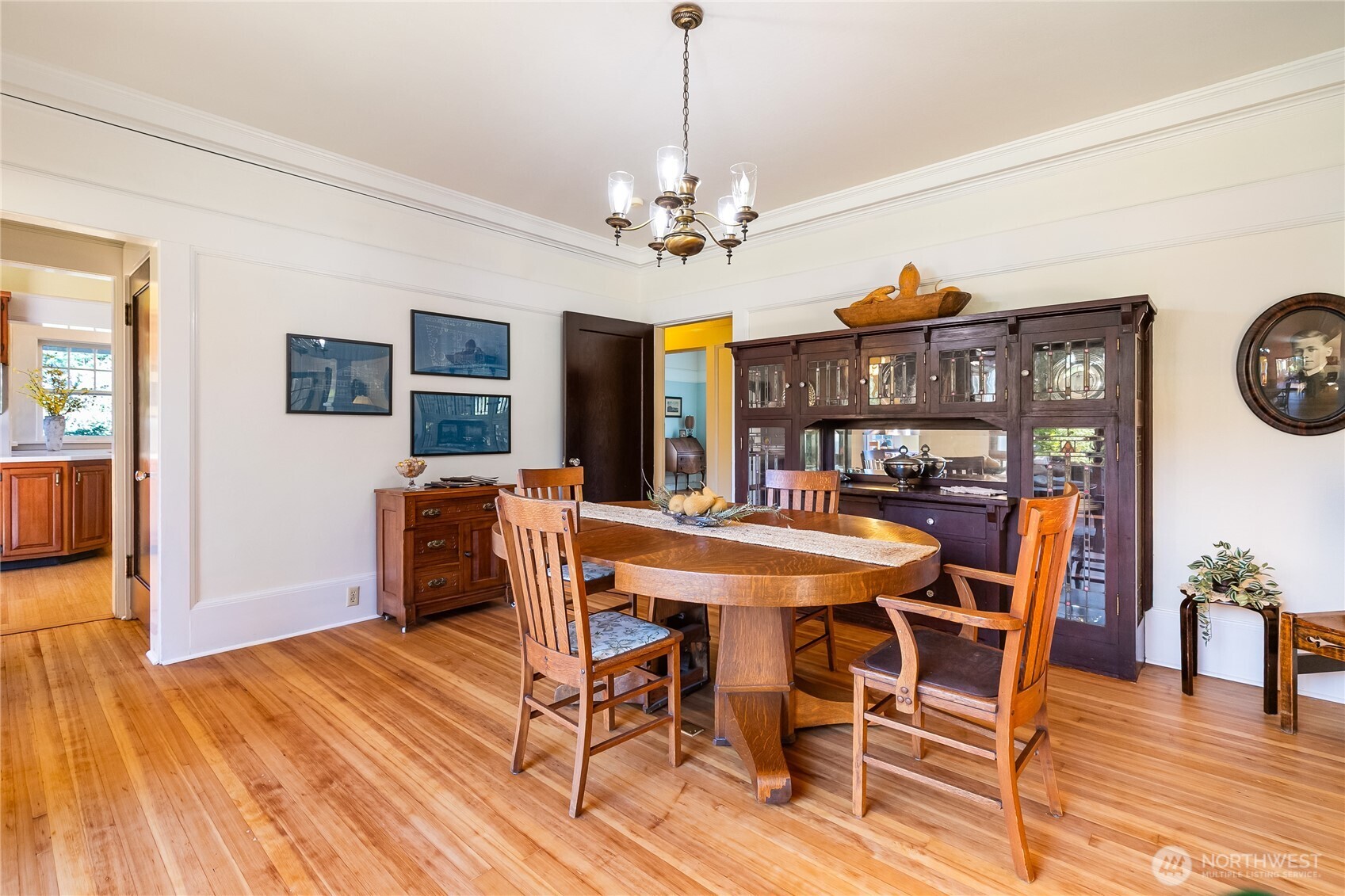 3905 Idaho Street Bellingham, WA 98229 - Photo 14 of 40 a view of a dining room with furniture wooden floor and chandelier