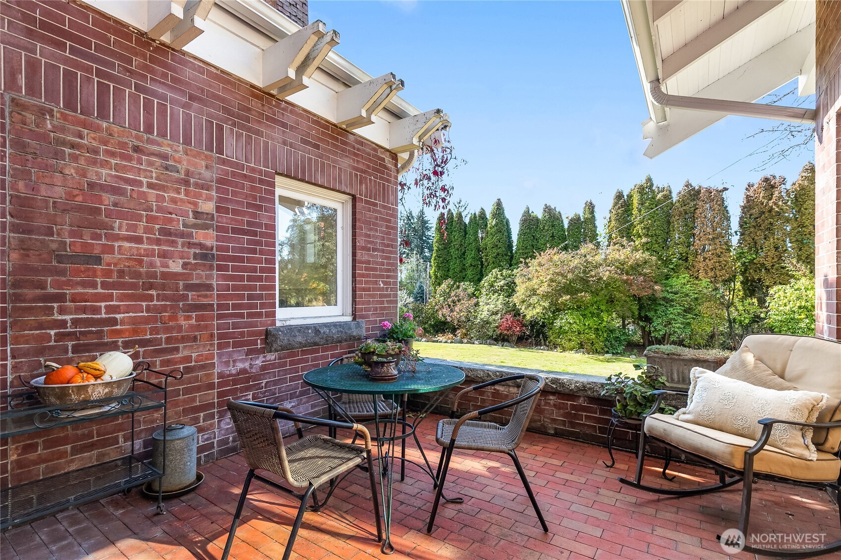 3905 Idaho Street Bellingham, WA 98229 - Photo 16 of 40 a backyard of a house with table and chairs