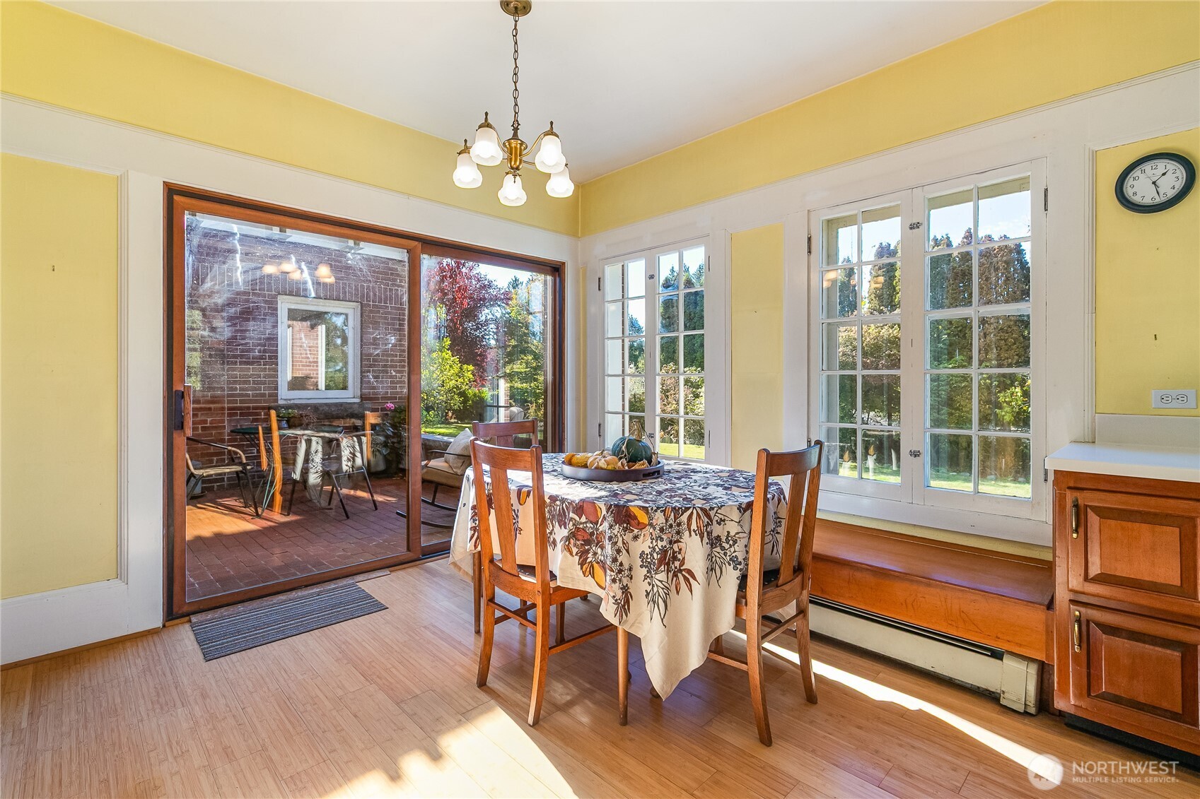 3905 Idaho Street Bellingham, WA 98229 - Photo 18 of 40 a view of a dining room with furniture wooden floor and chandelier