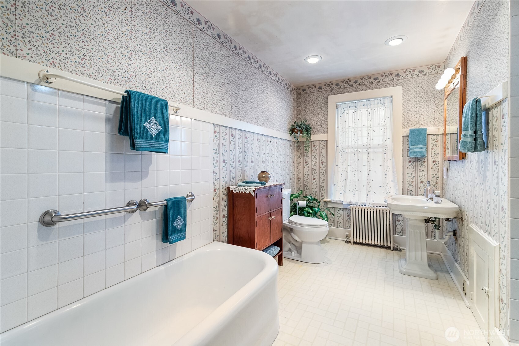 3905 Idaho Street Bellingham, WA 98229 - Photo 28 of 40 a bathroom with a double vanity sink toilet and shower