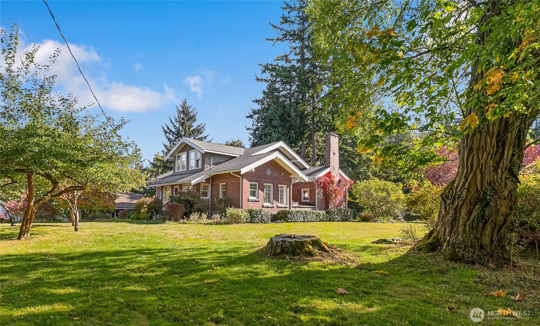 3905 Idaho Street Bellingham, WA 98229 - Photo 35 of 40 a view of house with garden space and trees