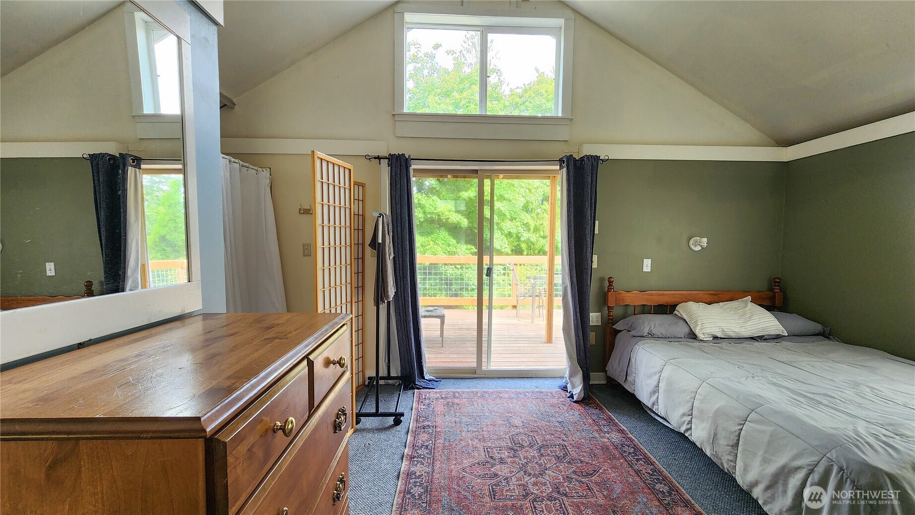 3905 Idaho Street Bellingham, WA 98229 - Photo 37 of 40 a bedroom with a bed and a large window