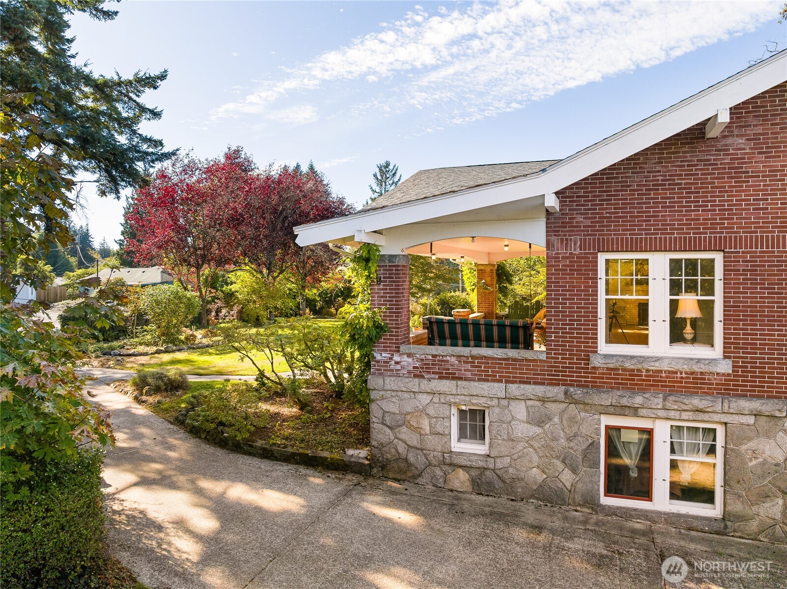 3905 Idaho Street Bellingham, WA 98229 - Photo 8 of 40 a view of a multi story residential apartment building with a yard