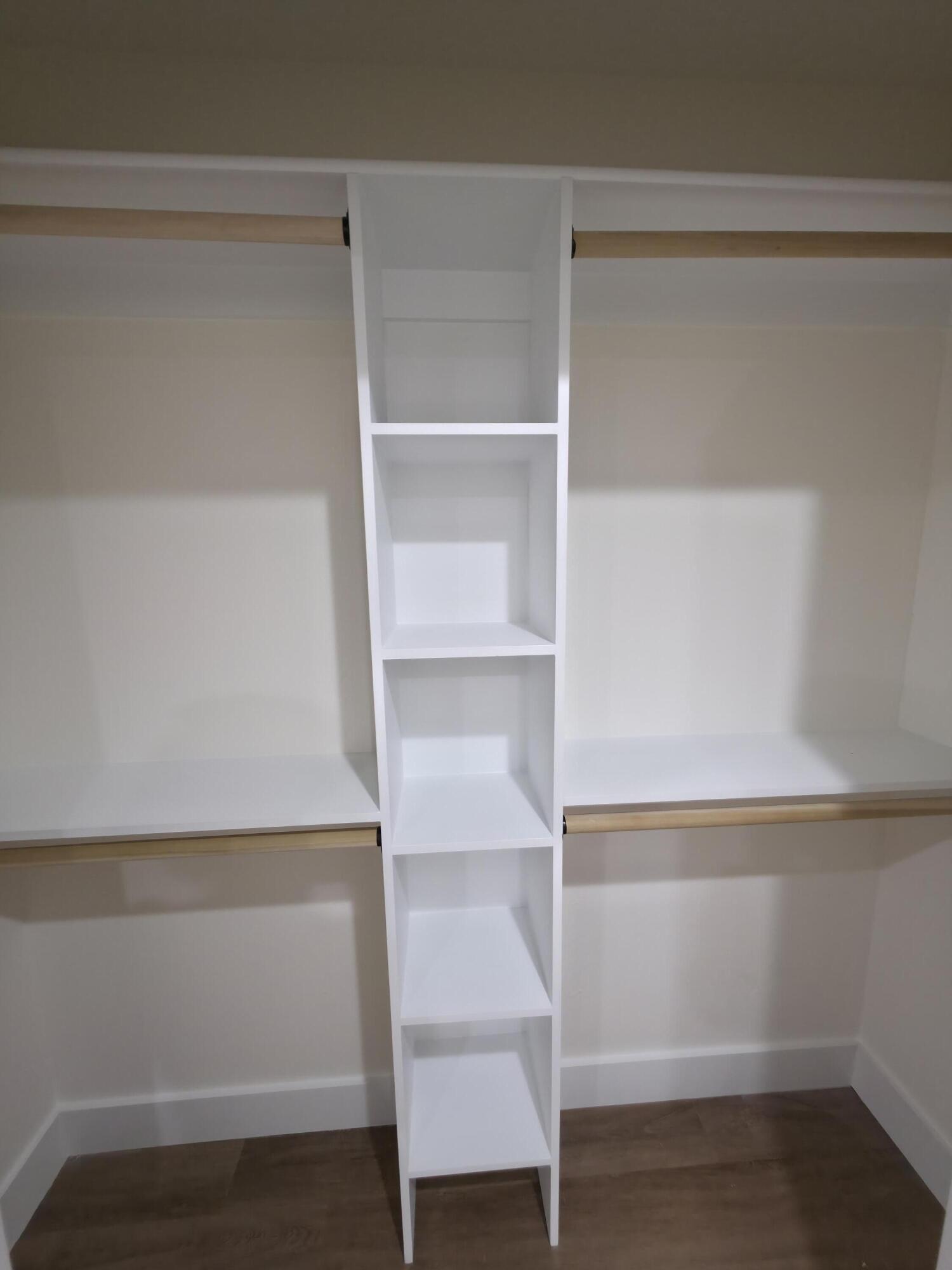 4699 Meadow Lake Drive Crestview, FL 32539 - Photo 23 of 38 a view of walk in closet with empty racks