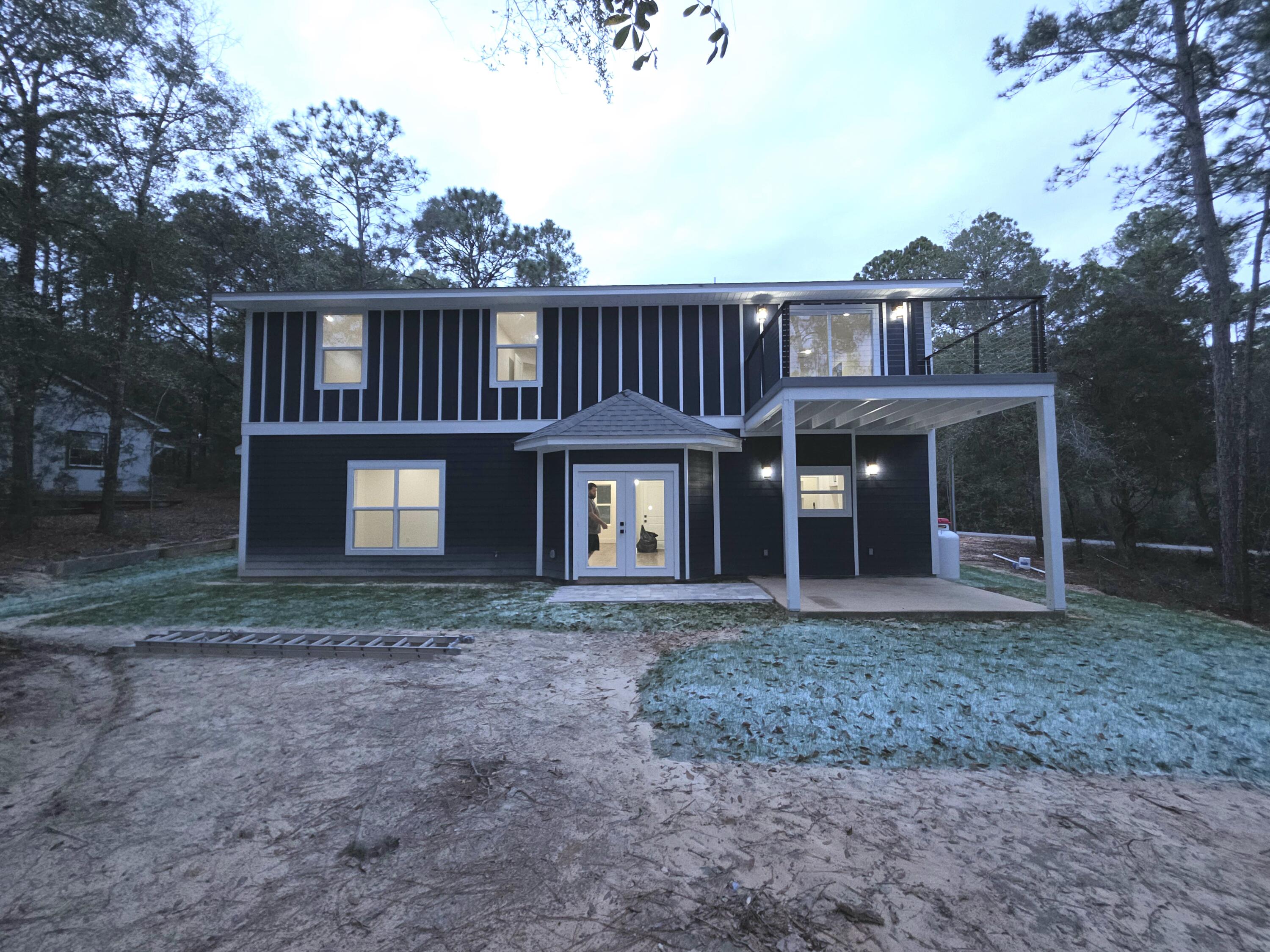 4699 Meadow Lake Drive Crestview, FL 32539 - Photo 36 of 38 a view of a house with a yard