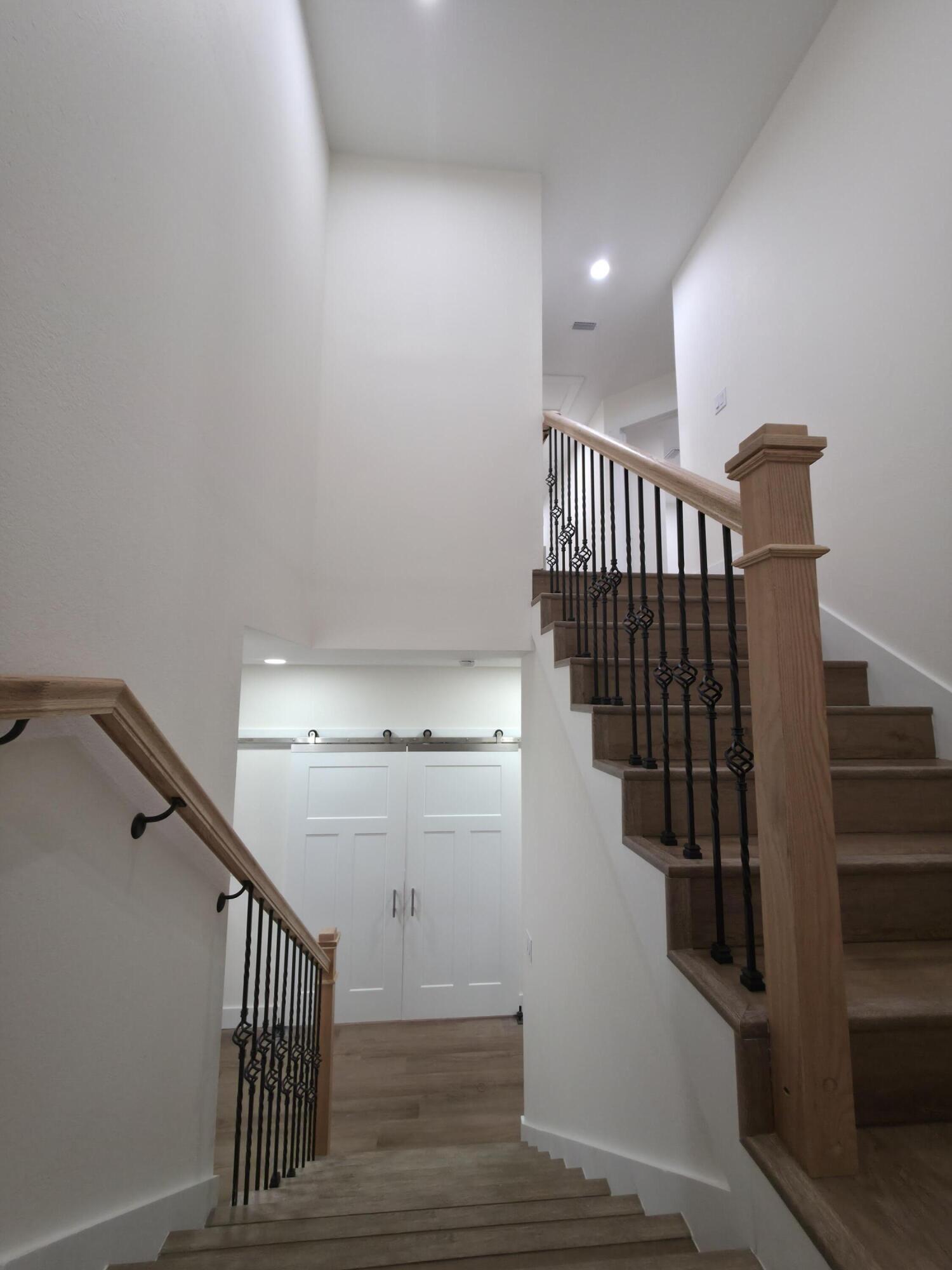 4699 Meadow Lake Drive Crestview, FL 32539 - Photo 7 of 38 a view of entryway and hall with wooden floor