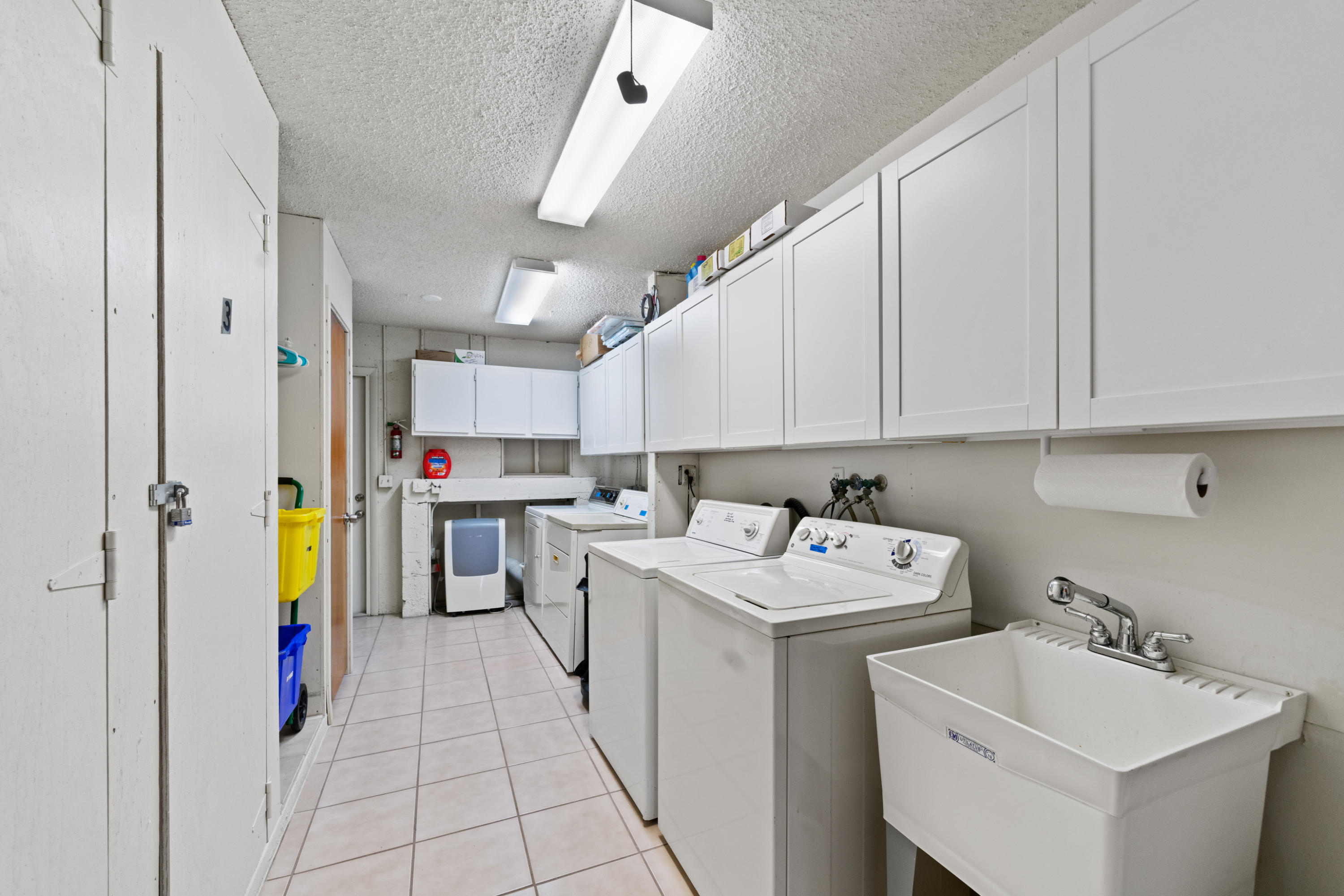 2016 Joy-Rene Lane North Palm Beach, FL 33408 - Photo 21 of 24 COMMON AREA LAUNDRY