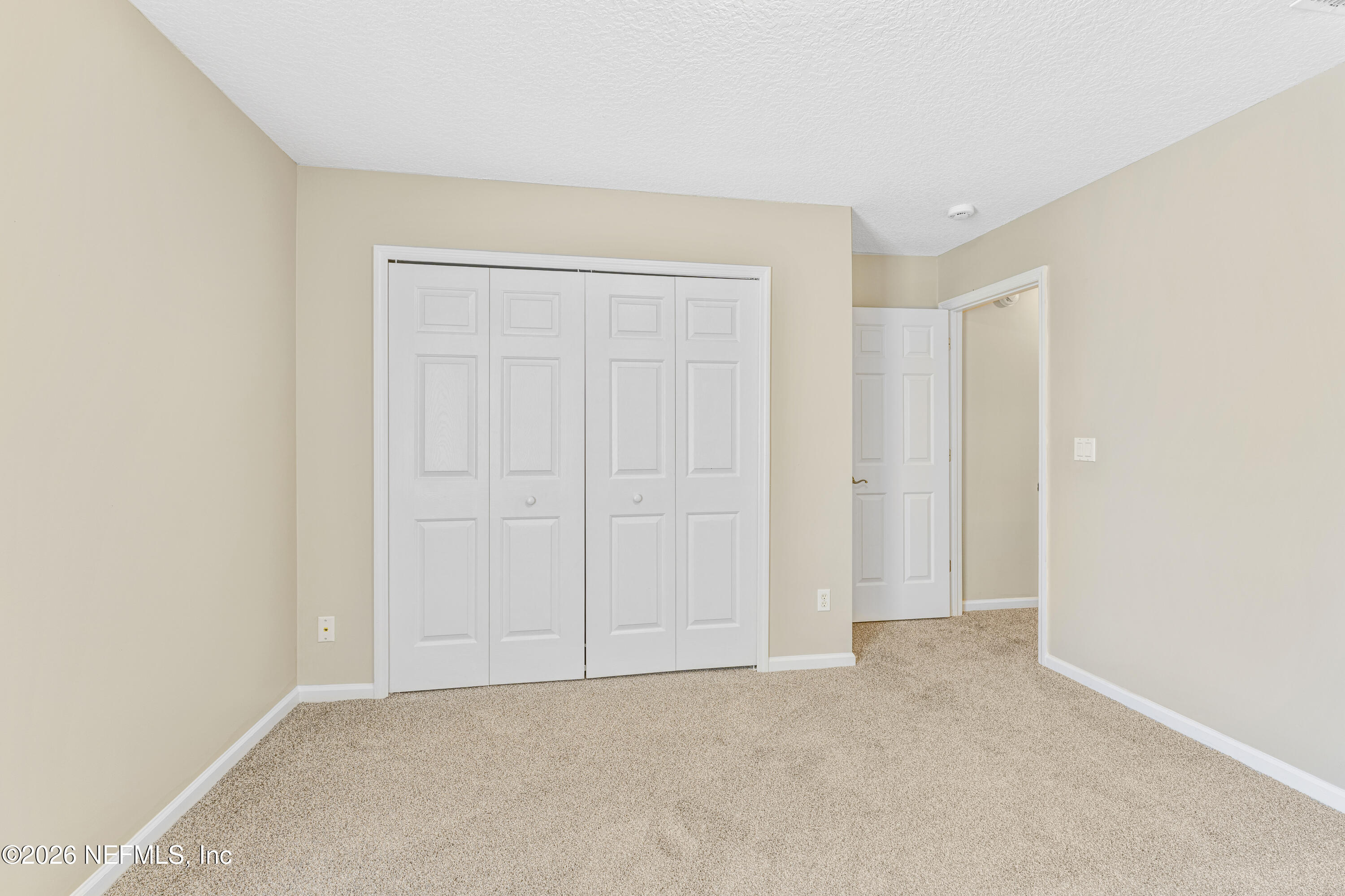 1896 Bluebonnet Way Fleming Island, FL 32003 - Photo 18 of 28 a view of an empty room