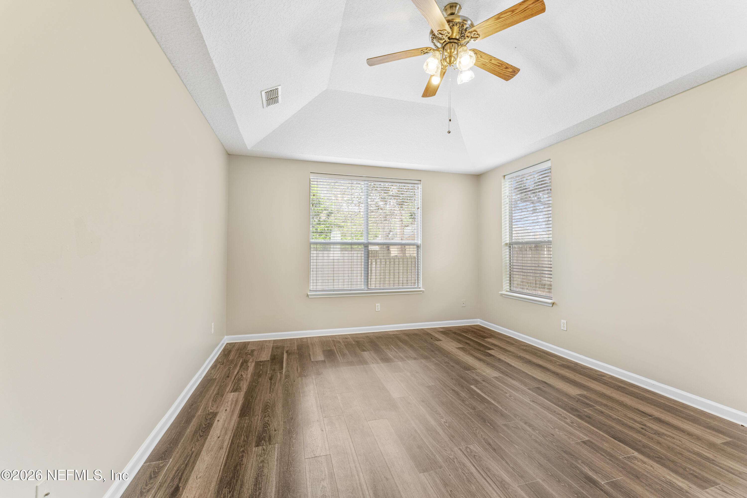1896 Bluebonnet Way Fleming Island, FL 32003 - Photo 22 of 28 a view of room with window and ceiling fan