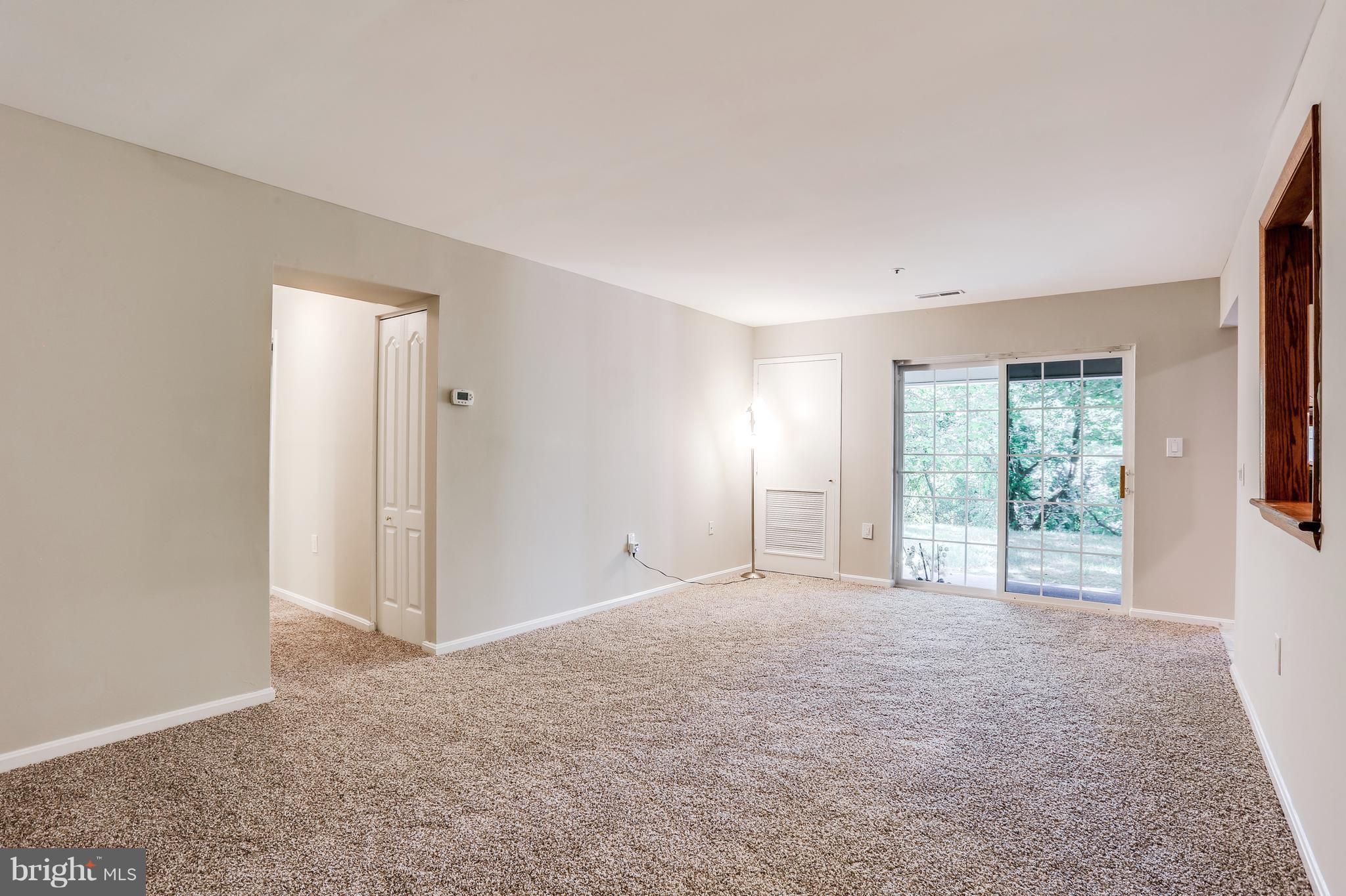 8385 Montgomery Run Road, Unit B Ellicott City, MD 21043 - Photo 12 of 29 View through slider to patio