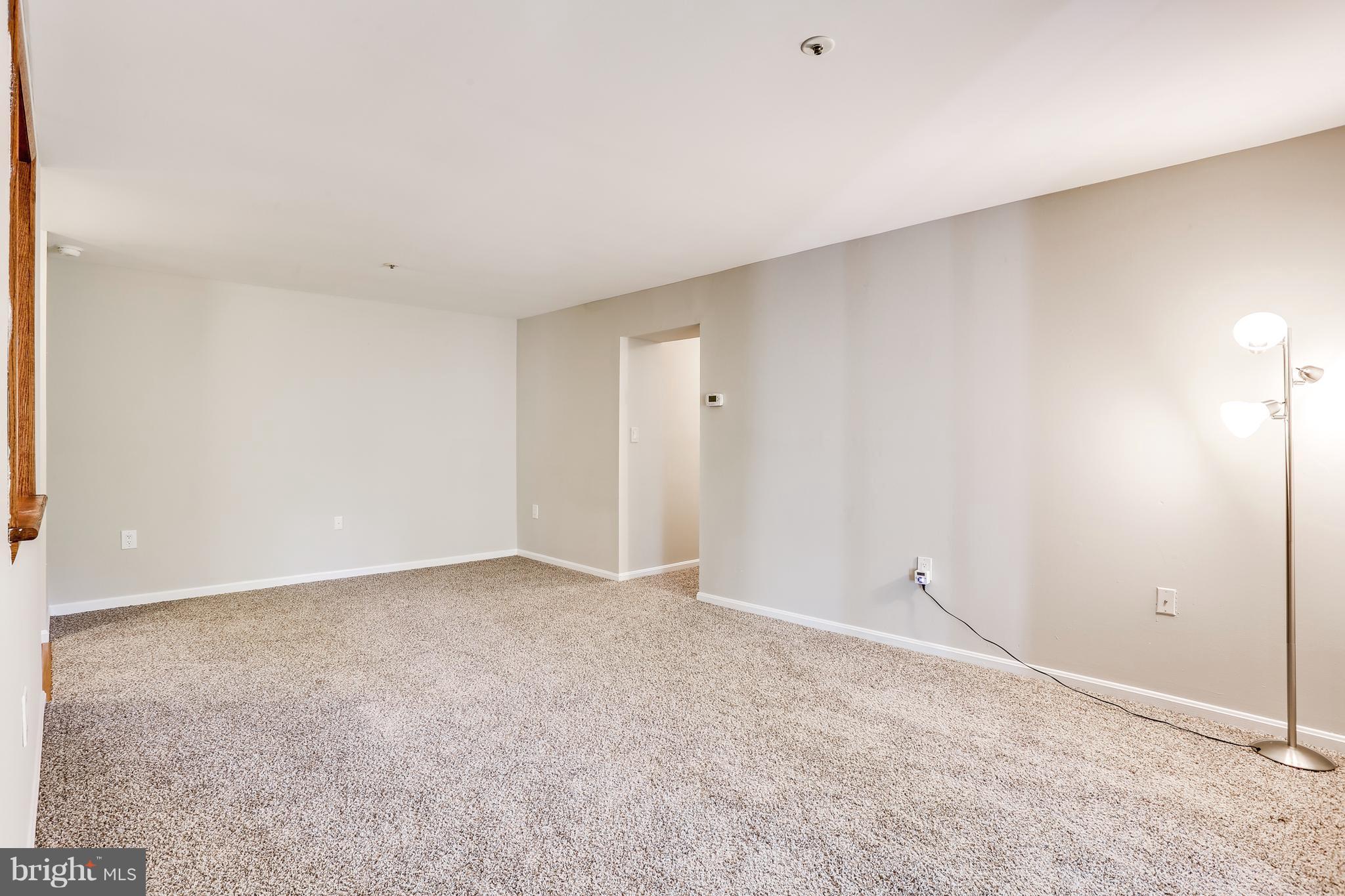 8385 Montgomery Run Road, Unit B Ellicott City, MD 21043 - Photo 10 of 29 Living Room with BRAND new carpet