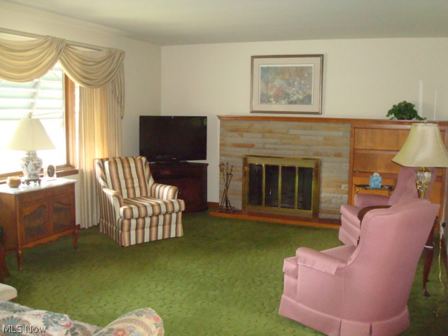 6608 Jefferson Road Ashtabula, OH 44004 - Photo 8 of 25 Living Room with wood burning fireplace