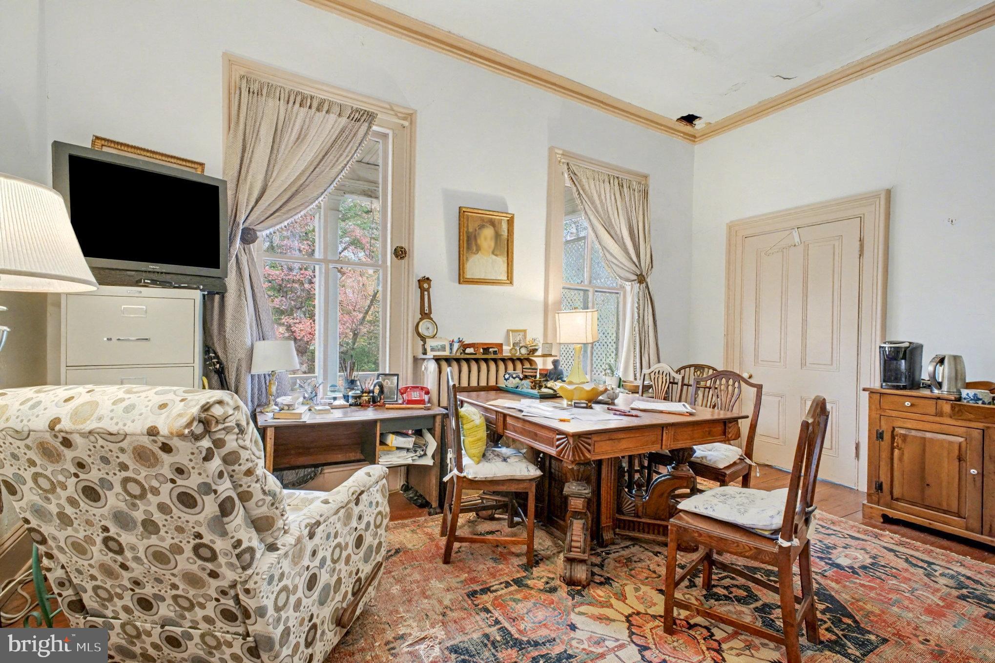 900 Ficklen Road Fredericksburg, VA 22405 - Photo 14 of 46 a view of a livingroom with furniture and a flat screen tv