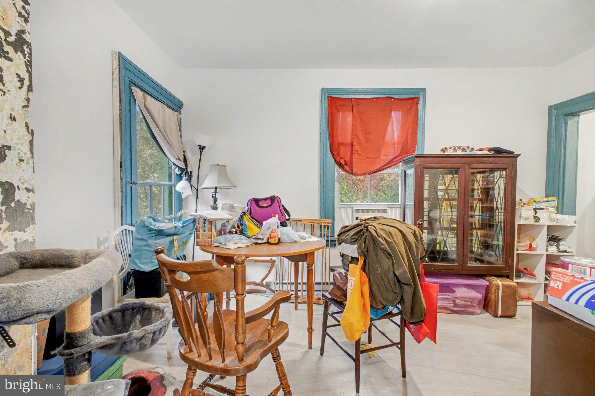 900 Ficklen Road Fredericksburg, VA 22405 - Photo 30 of 46 a living room with furniture a rug and a floor to ceiling window
