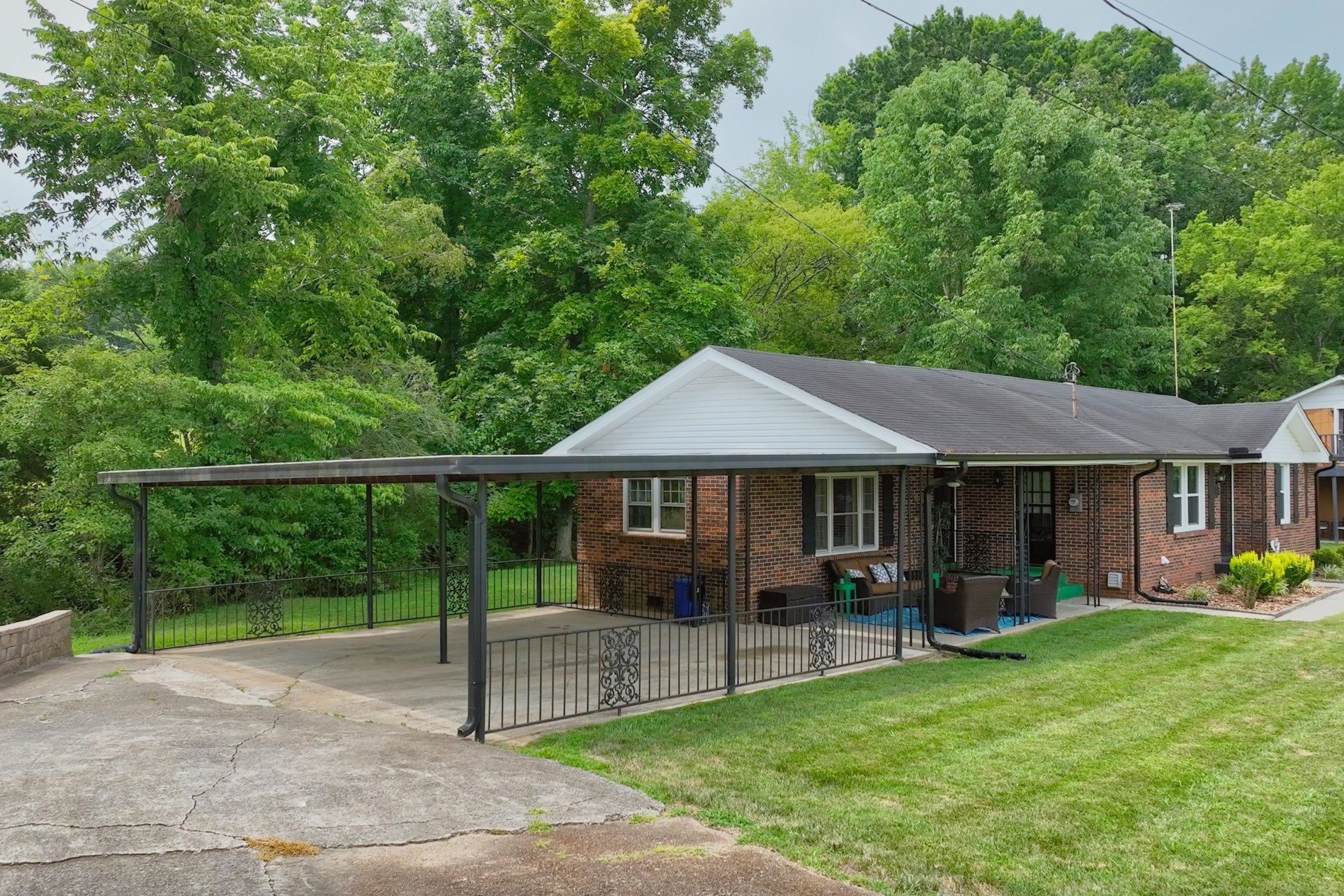 7809 Melton Road White House, TN 37188 - Photo 5 of 64 a view of a house with porch and garden