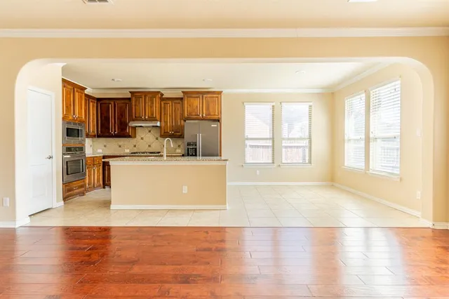 a view of a living room with a large window