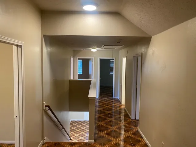 an empty room with windows