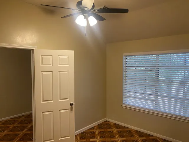 a view of a window in an empty room