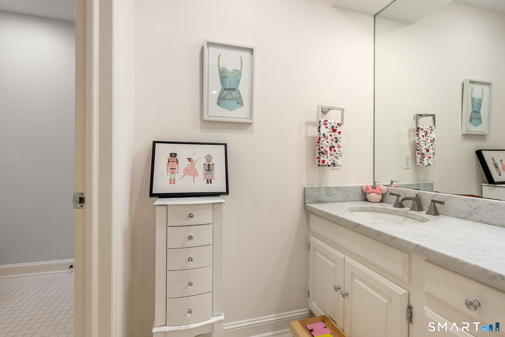 9 Pepperbush Road Weston, CT 06883 - Photo 13 of 48 a bathroom with a sink and a mirror