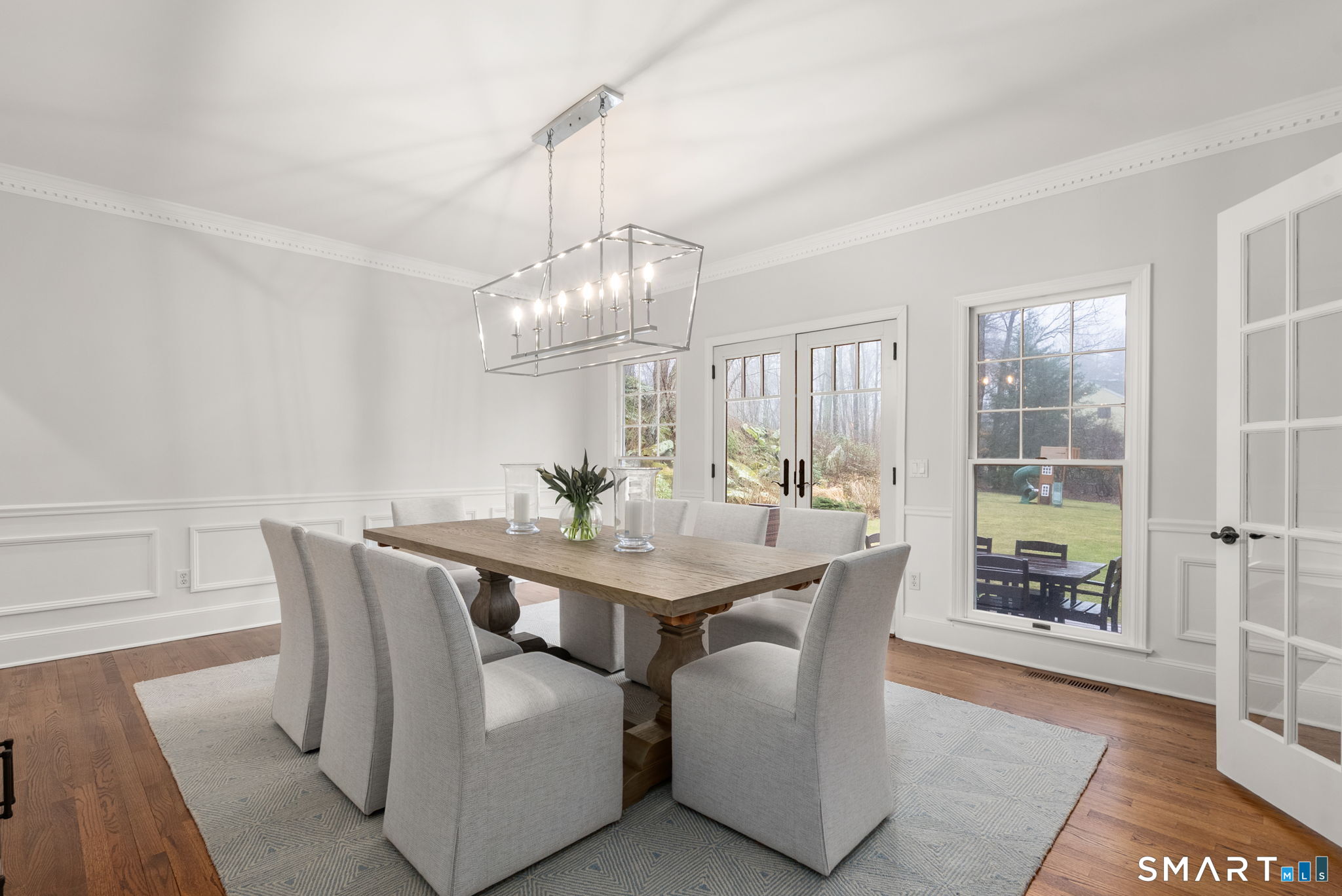 9 Pepperbush Road Weston, CT 06883 - Photo 16 of 48 a view of a dining room with furniture window and outside view