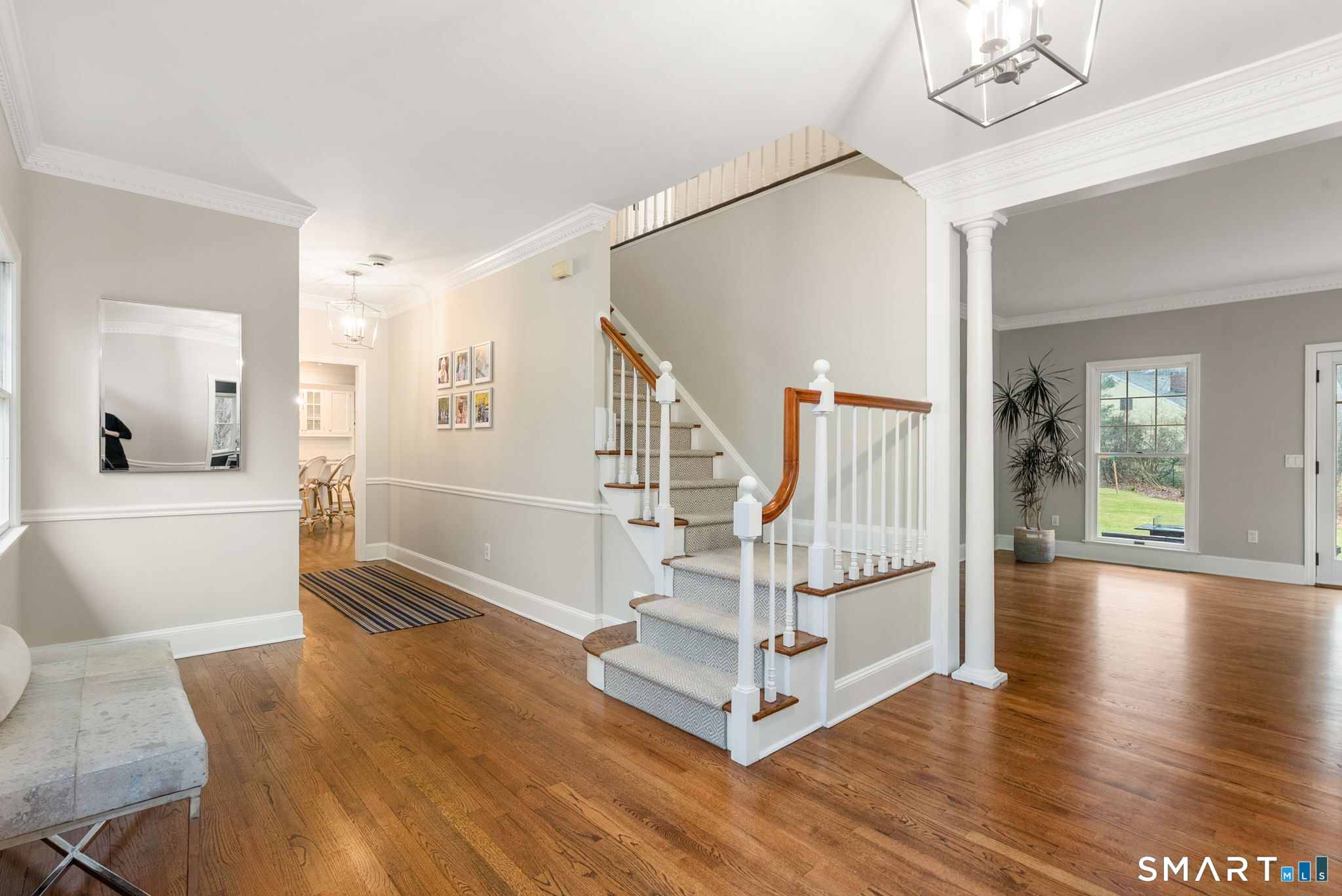 9 Pepperbush Road Weston, CT 06883 - Photo 17 of 48 a view of an entryway with wooden floor and a livingroom
