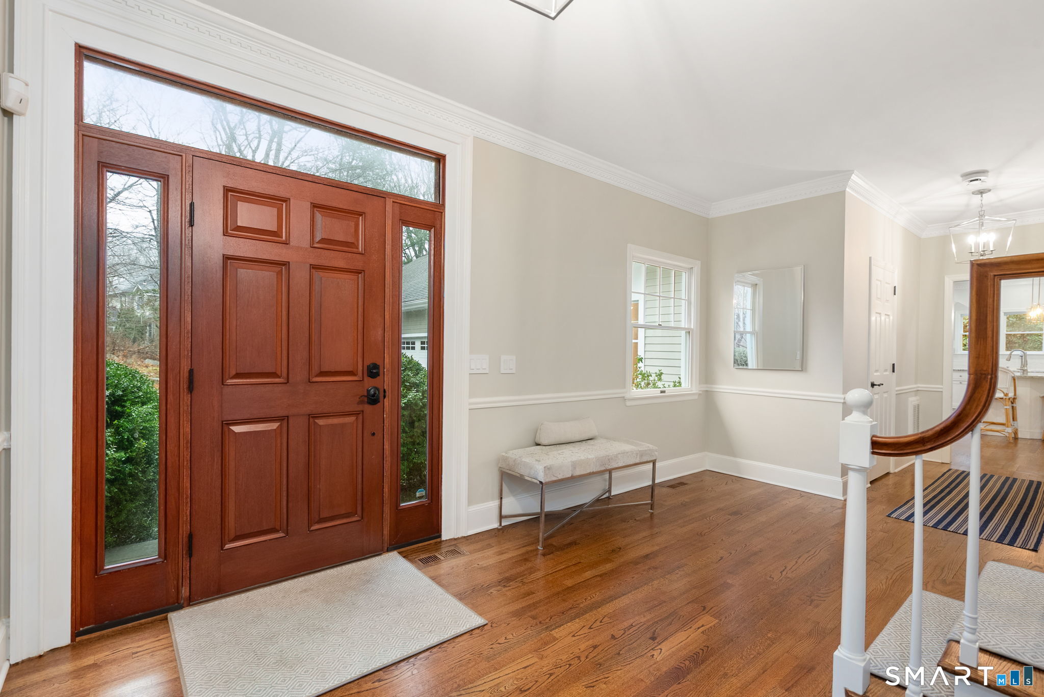 9 Pepperbush Road Weston, CT 06883 - Photo 18 of 48 a view of a livingroom with furniture and front door