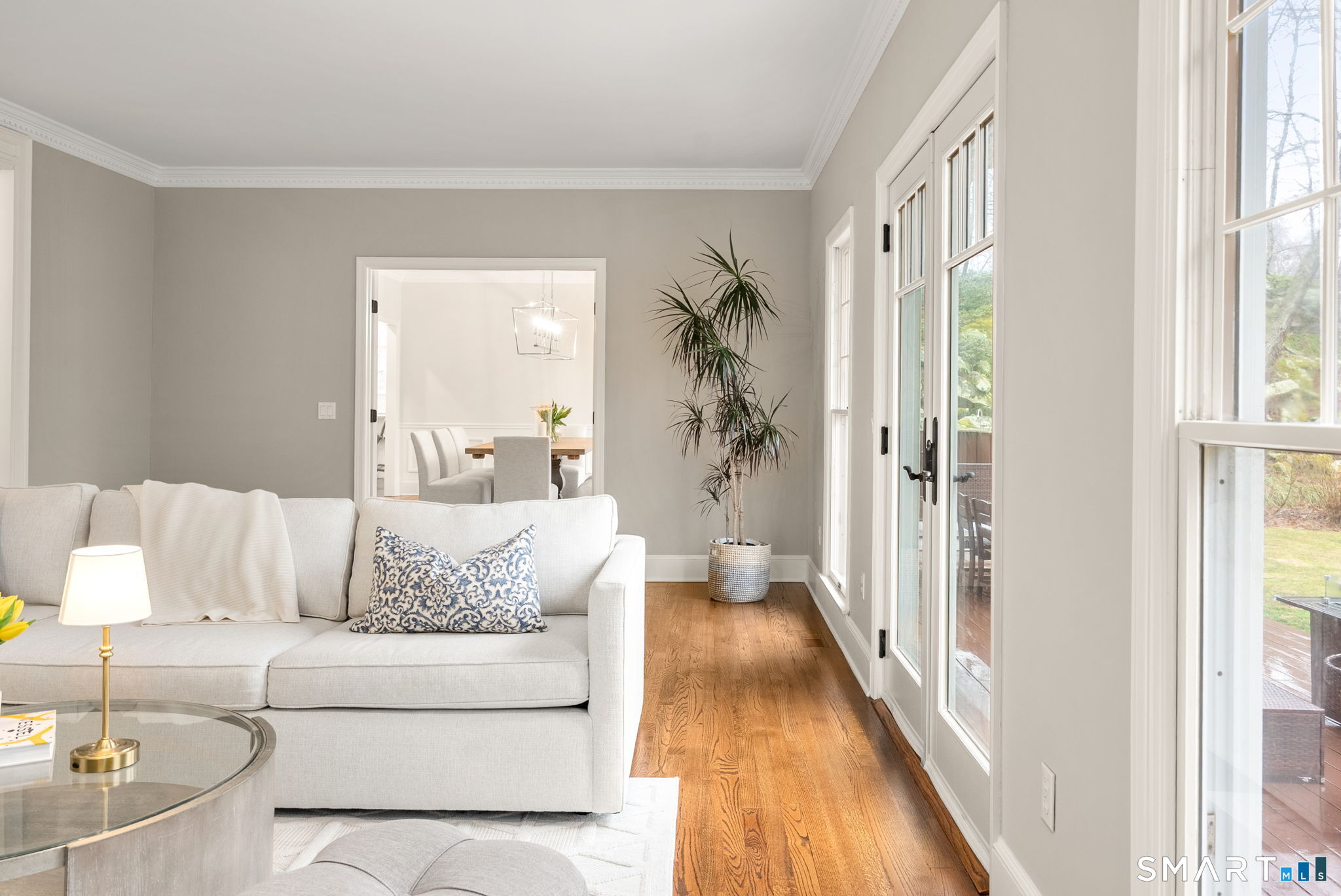 9 Pepperbush Road Weston, CT 06883 - Photo 22 of 48 a living room with furniture and a large window