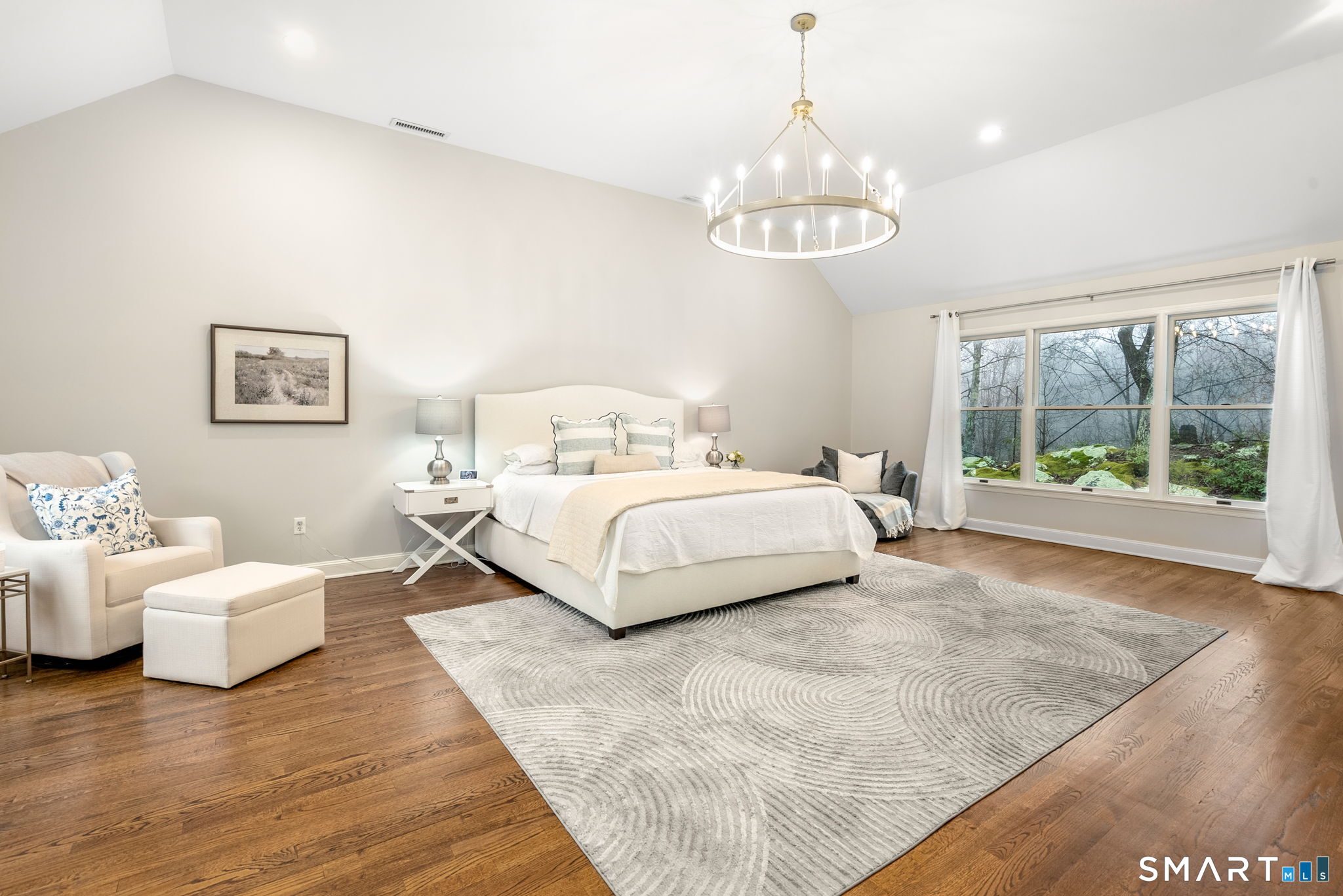 9 Pepperbush Road Weston, CT 06883 - Photo 27 of 48 a bedroom with a bed and a large window