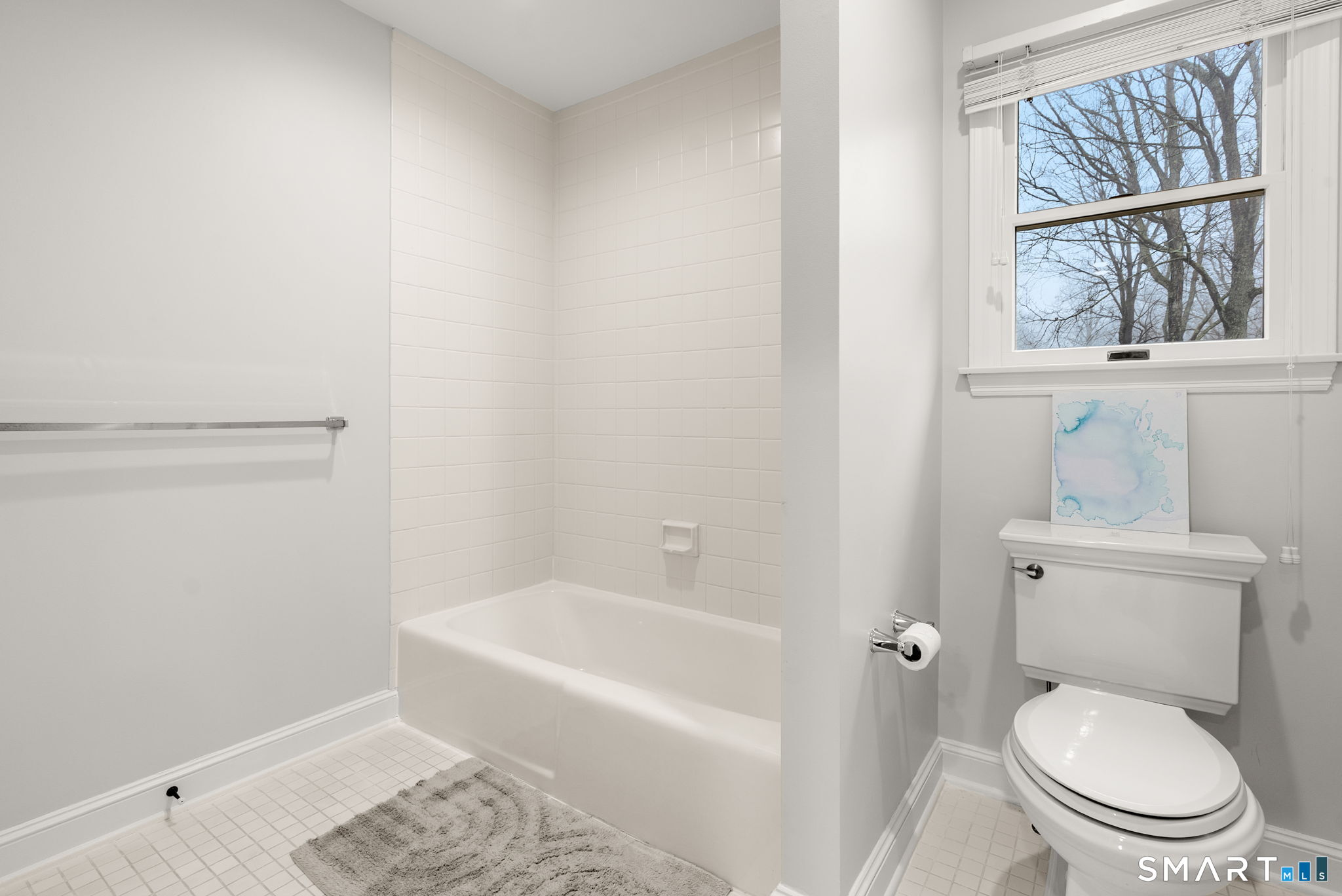 9 Pepperbush Road Weston, CT 06883 - Photo 32 of 48 a white toilet sitting next to a bath tub