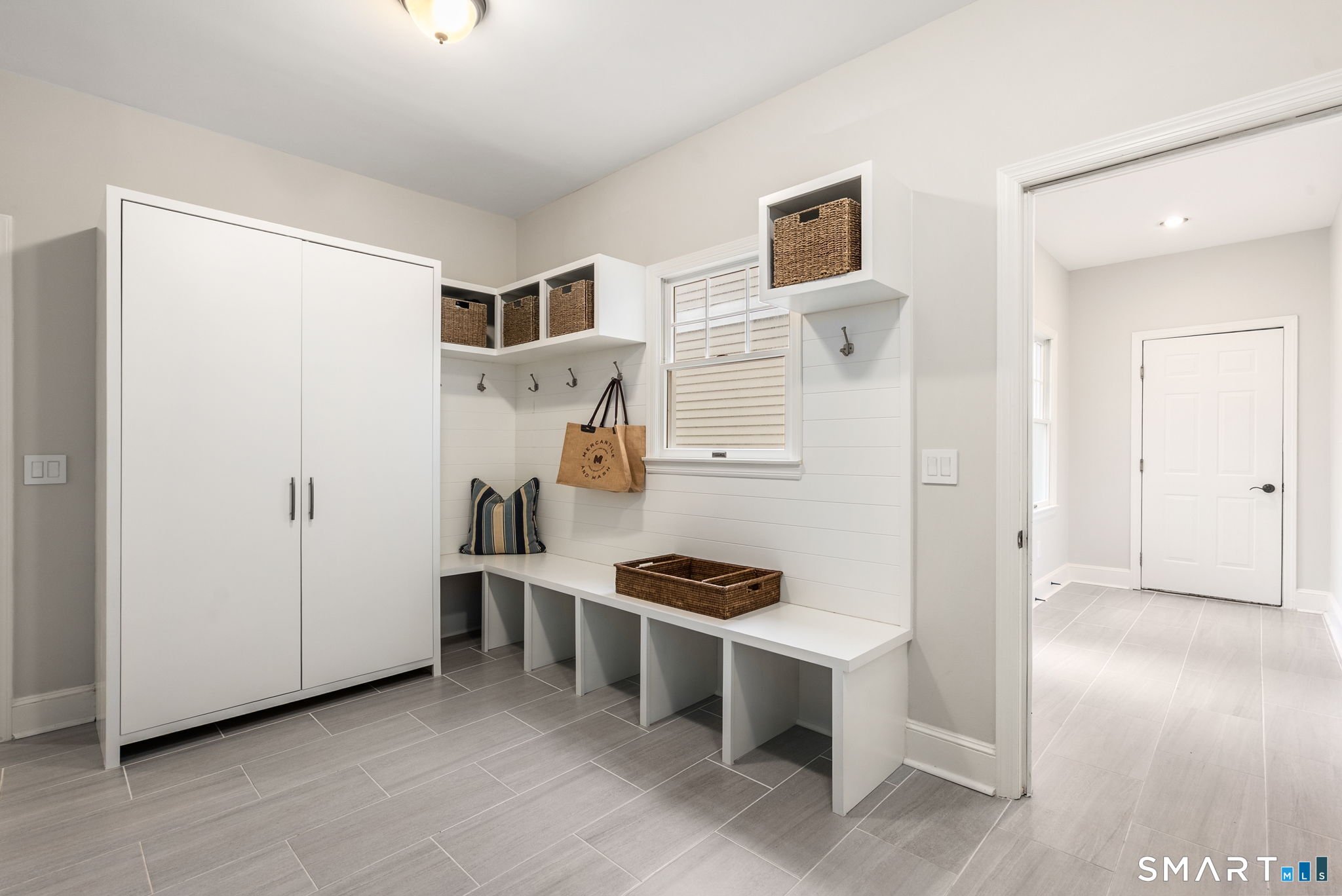 9 Pepperbush Road Weston, CT 06883 - Photo 37 of 48 a view of kitchen with stainless steel appliances cabinets and wooden floor