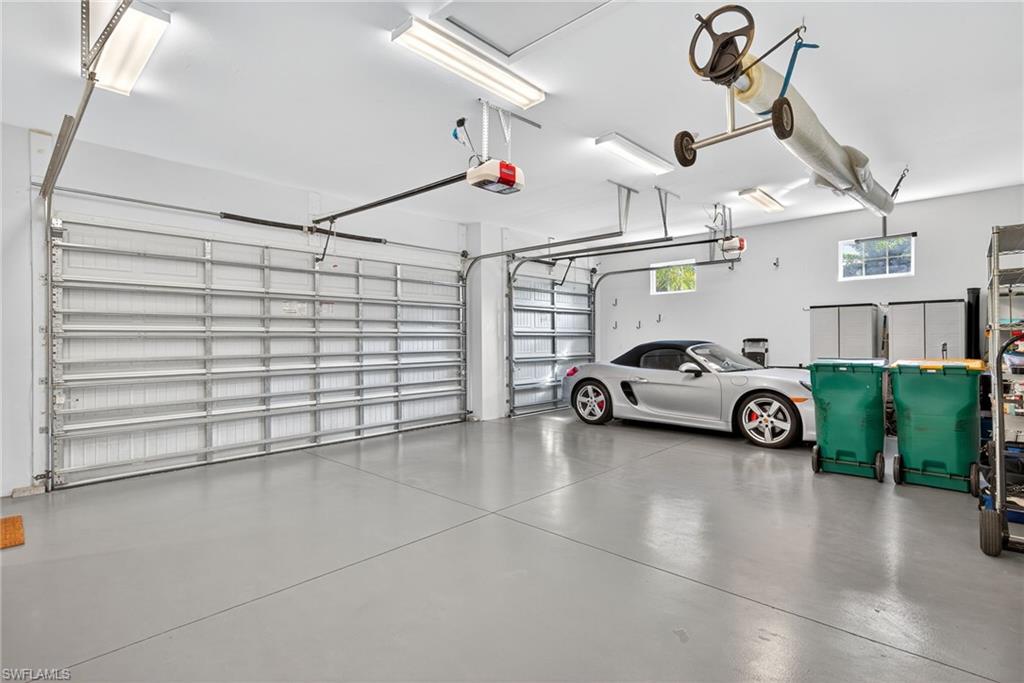2305 Harrier Run Naples, FL 34105 - Photo 33 of 50 a view of a garage