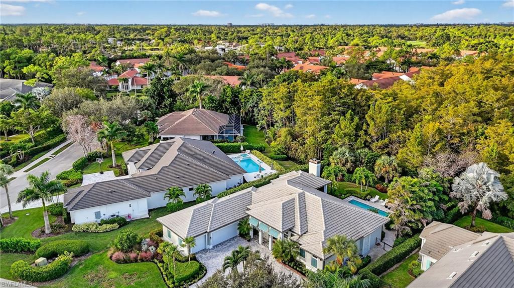 2305 Harrier Run Naples, FL 34105 - Photo 45 of 50 an aerial view of a house with a garden