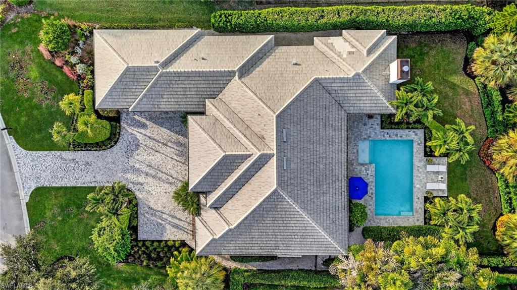 2305 Harrier Run Naples, FL 34105 - Photo 49 of 50 an aerial view of a house with a yard