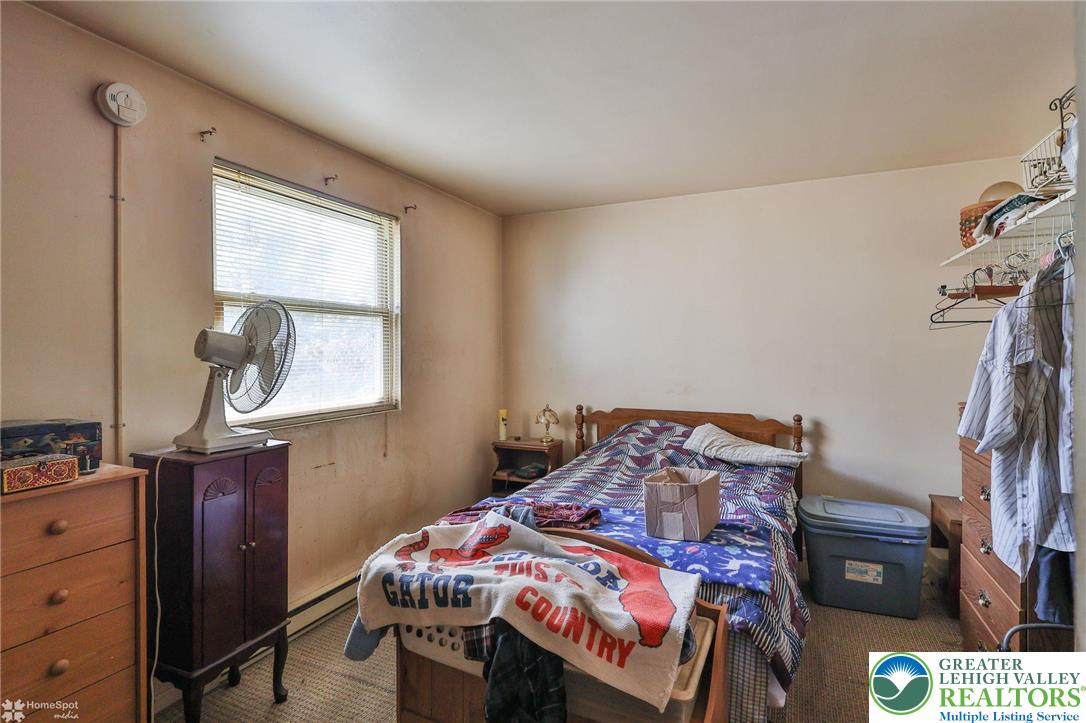 802 West Berwick Street Easton, PA 18042 - Photo 43 of 54 a bedroom with a bed and a window