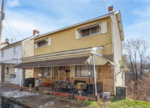 a view of a house with patio