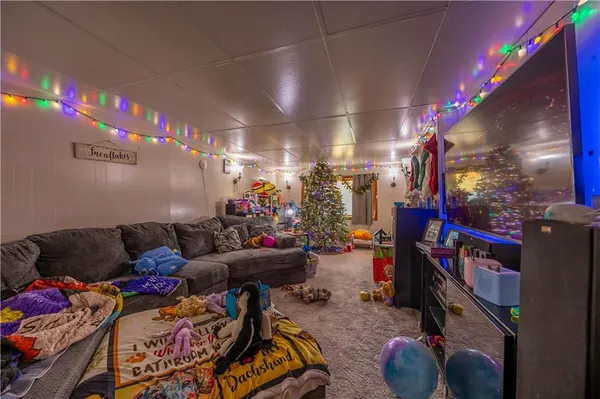 a room with furniture and toys