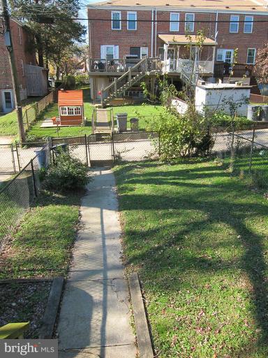 8540 Water Oak Road Baltimore, MD 21234 - Photo 11 of 12 a front view of building with yard