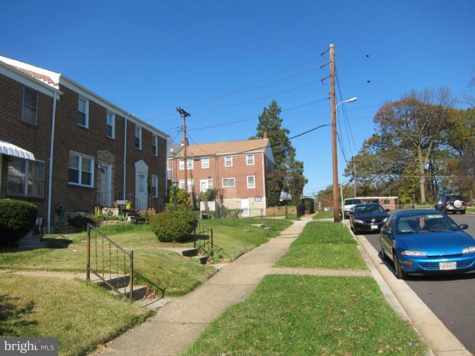 8540 Water Oak Road Baltimore, MD 21234 - Photo 12 of 12 a view of a building with a yard