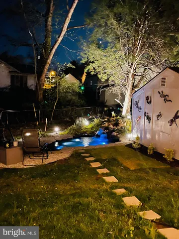 a view of a backyard of the house