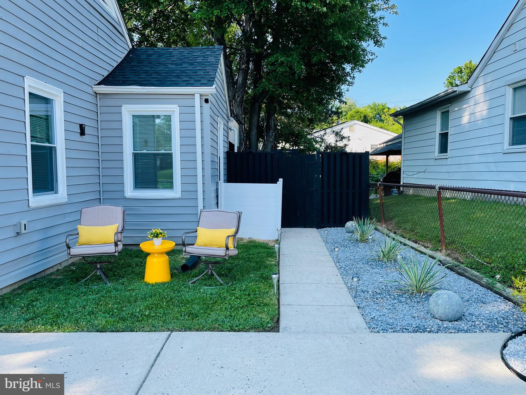 2723 Randolph Road Silver Spring, MD 20902 - Photo 3 of 33 a view of a house with a yard and sitting area